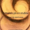 Sittande på en stubbe