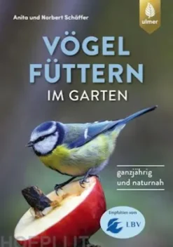 Vögel füttern im Garten
